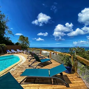 https://anoli-lodges-village.comcaribbean.com